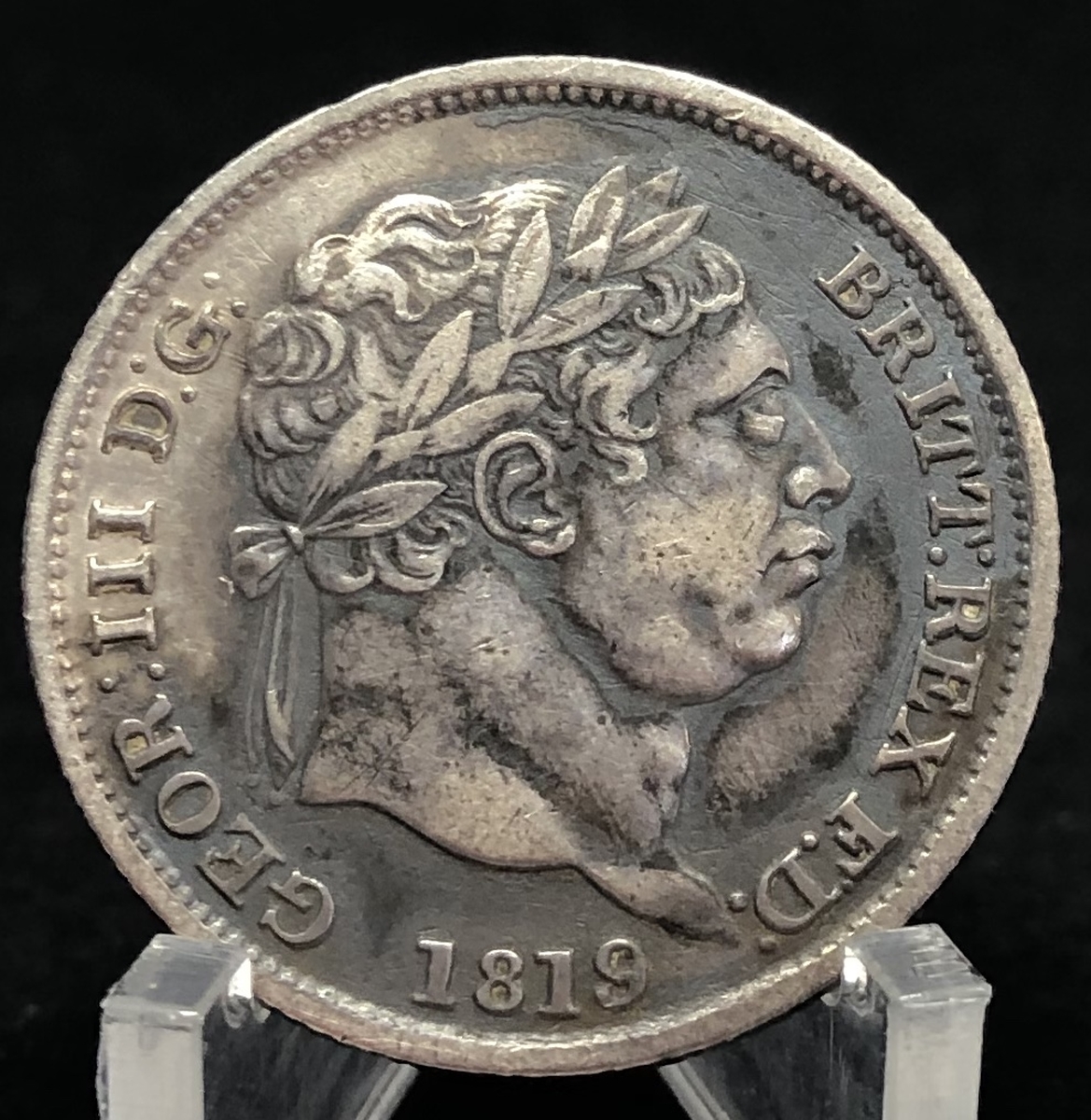 Moeda da Inglaterra 1 shilling 1819 Prata (.925) Moeda da Inglaterra 1 shilling 1819 Prata (.925)