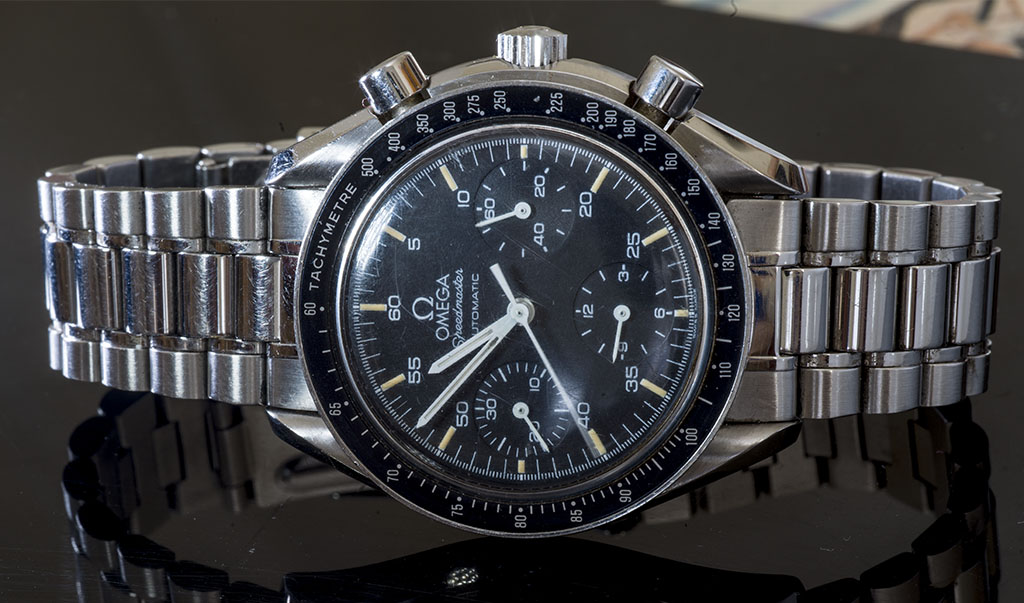 RELÓGIO OMEGA SPEEDMASTER AUTOMÁTICO EM AÇO. MOSTRADOR