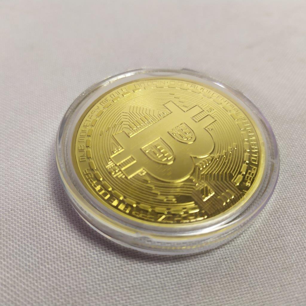 7. Bela moeda física de BITCOIN, que tem seu sistema de