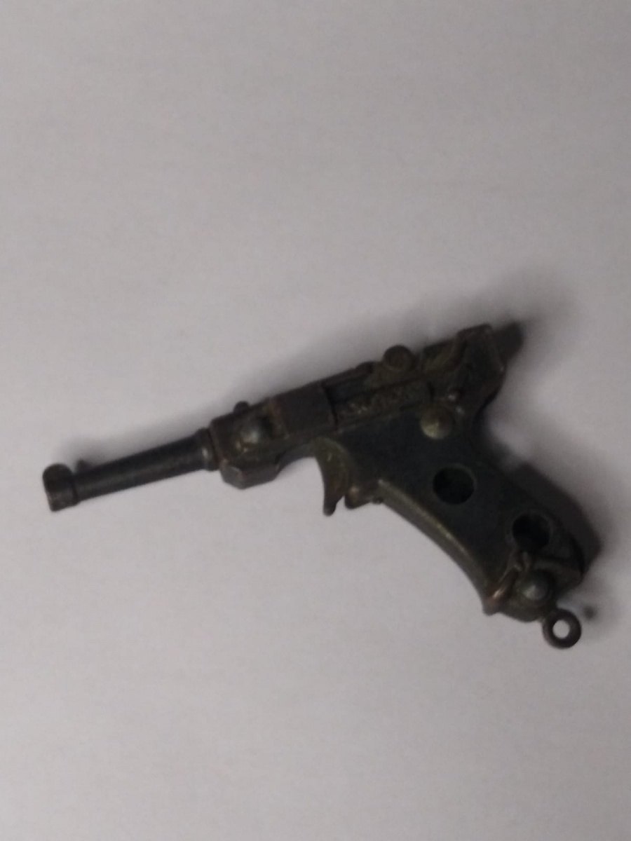 Antiga arma de brinquedo (espoleta) em metal e madeira