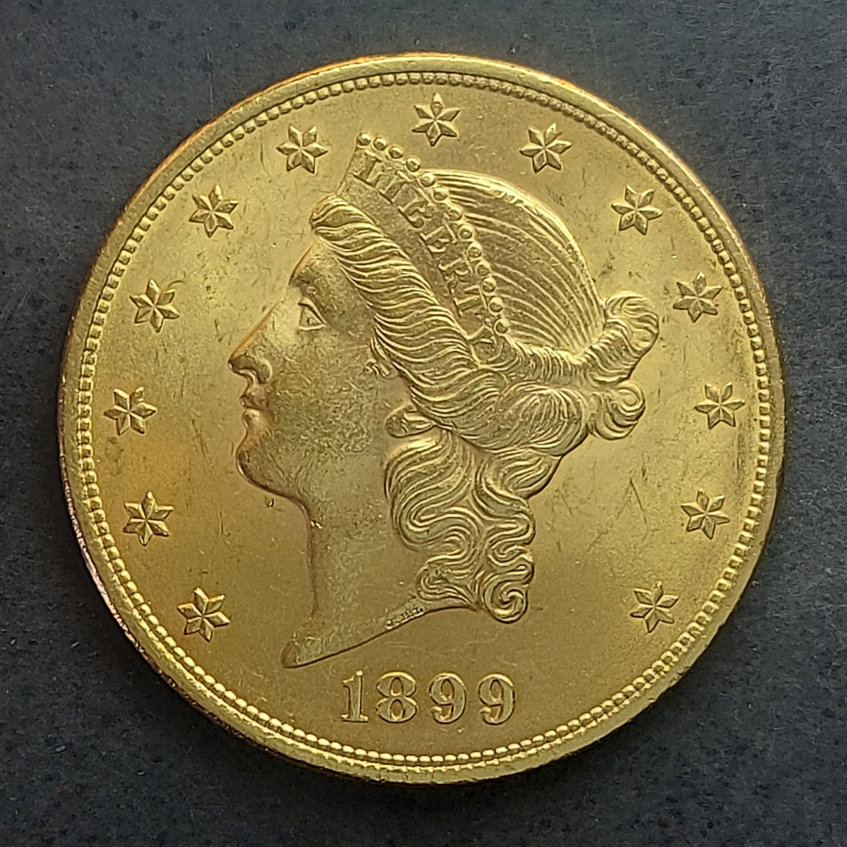 MOEDA EUA OURO 20 DOLLARS 1899 PESO 33.45GR O