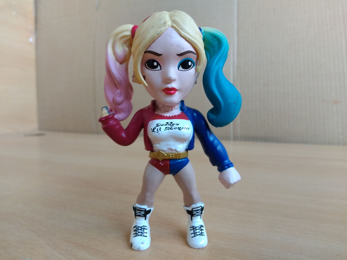 Boneca Arlequina personagem da Dc Comics e com particip