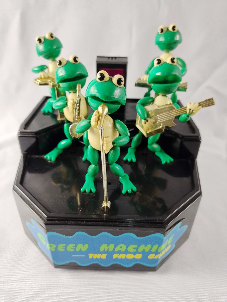 BRINQUEDO MUSICAL - GREEN MACHINE - THE FLOG BAND - ``