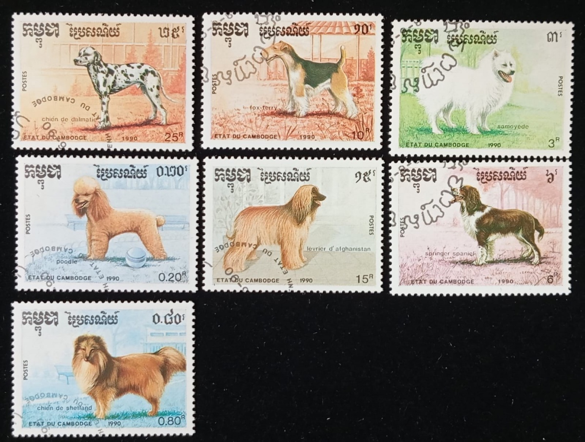 Camboja - Cães, série de 7 selos carimbados.