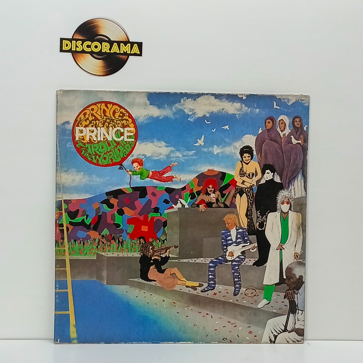 PRINCE AND THE REVOLUTION  -  AROUND THE WORLD IN A DAY  -  CAPA GATEFOLD  -  ASPECTO DO DISCO: VG+/EXCELENTE  /  ASPECTO DA CAPA: VG+ (POSSUI DESGASTES NAS BORDAS)  -  1985  -  LP DISCO DE VINIL (Verifique com atenção ...