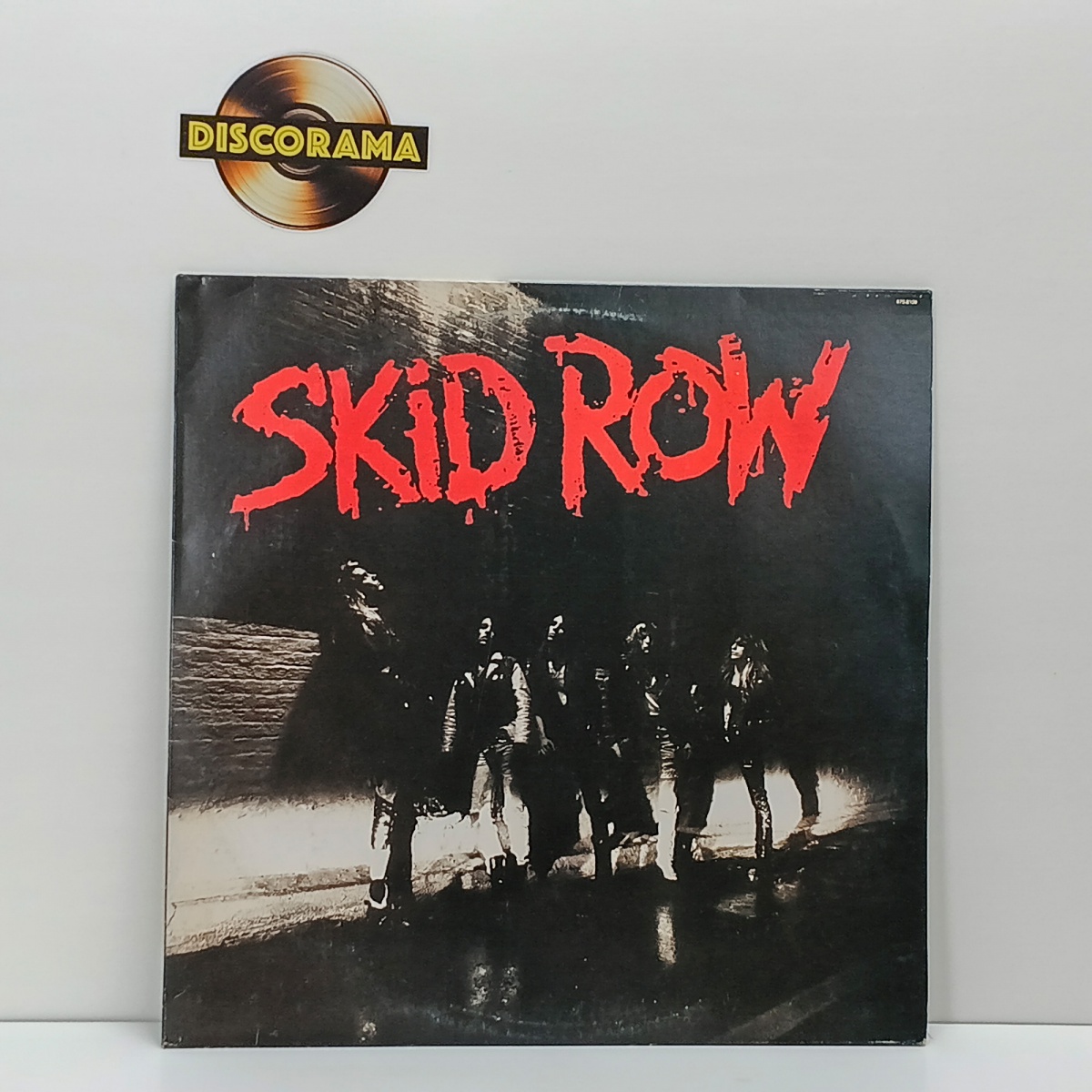 SKID ROW  -  SKID ROW  -  POSSUI ENCARTE  -  ASPECTO DO DISCO: EXCELENTE  /  ASPECTO DA CAPA: EXCELENTE  -  1989  -  LP DISCO DE VINIL (Verifique com atenção as imagens deste lote e entre em contato conosco até um dia ...