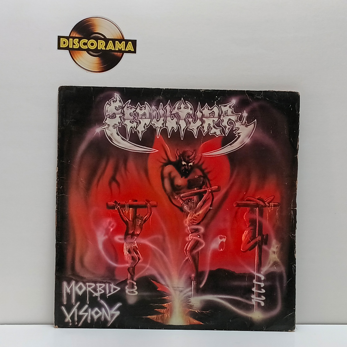SEPULTURA  -  MORBID VISIONS  -  POSSUI ENCARTE  -  ASPECTO DO DISCO: VG+/EXCELENTE  /  ASPECTO DA CAPA: VG  -  1986  -  LP DISCO DE VINIL (Verifique com atenção as imagens deste lote e entre em contato conosco até um ...