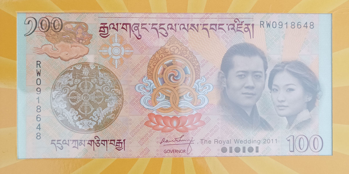 Folder Oficial Cédula Buthão – 100 Ngultrum – 2011 – Casamento Real Rei Jigme Wangchuk, Rainha Jetsun Pema  – FE