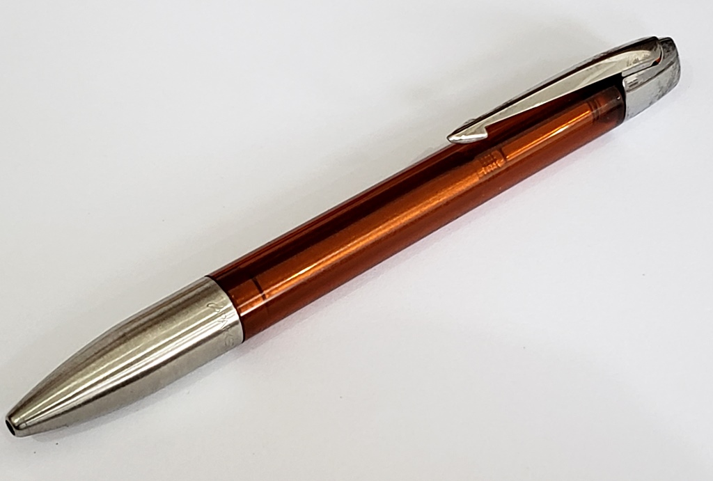 PARKER, estilosa caneta esferográfica, modelo Vector XL, na cor Crystal Amber, em funcionamento, marcas de uso, colecionável.