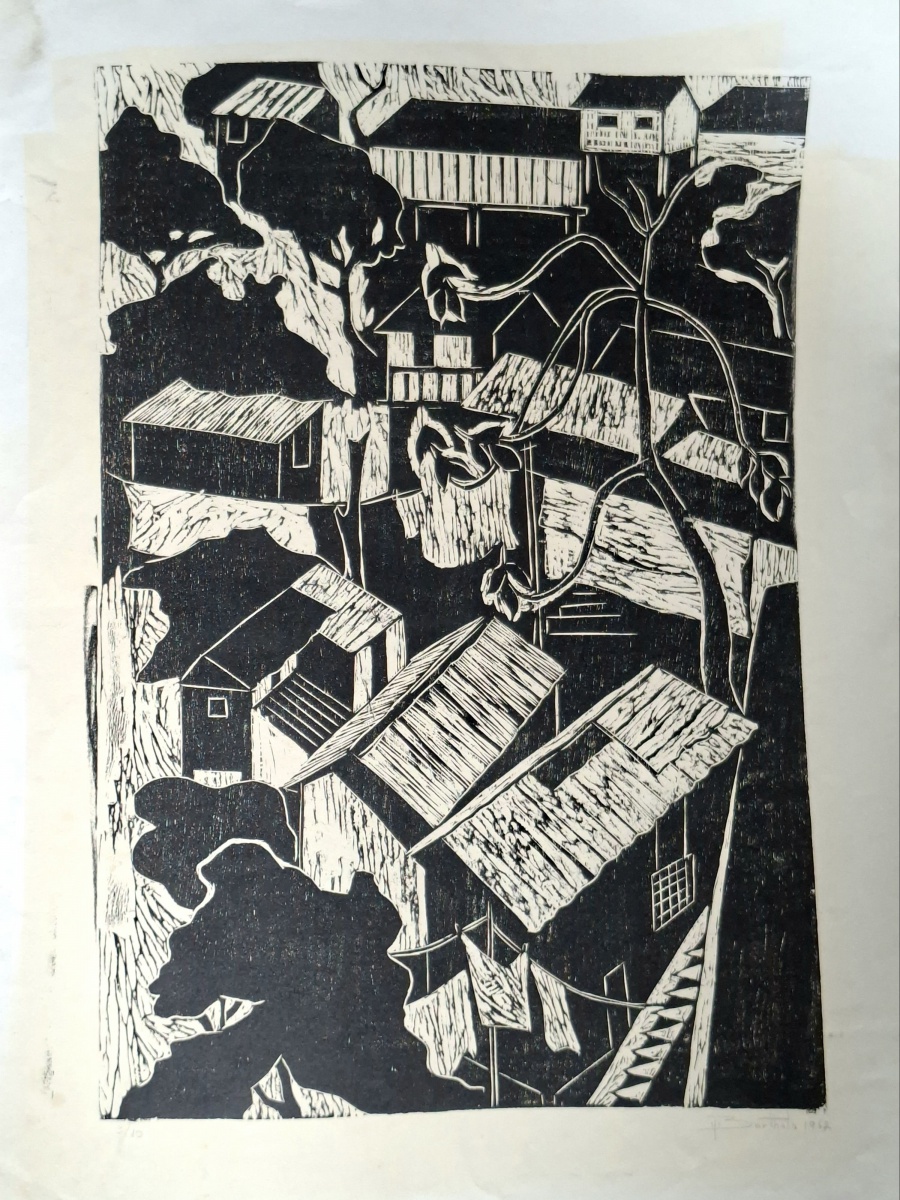 MARINA BARTHOLO (1933 - ) – Xilogravura de autoria da artista Marina Bartholo, retratando casas pobres, assinada e numerada (3/10). Marina expôs na 1ª Exposição da Jovem Gravura Nacional e na 12ª Bienal de São Paulo. ...