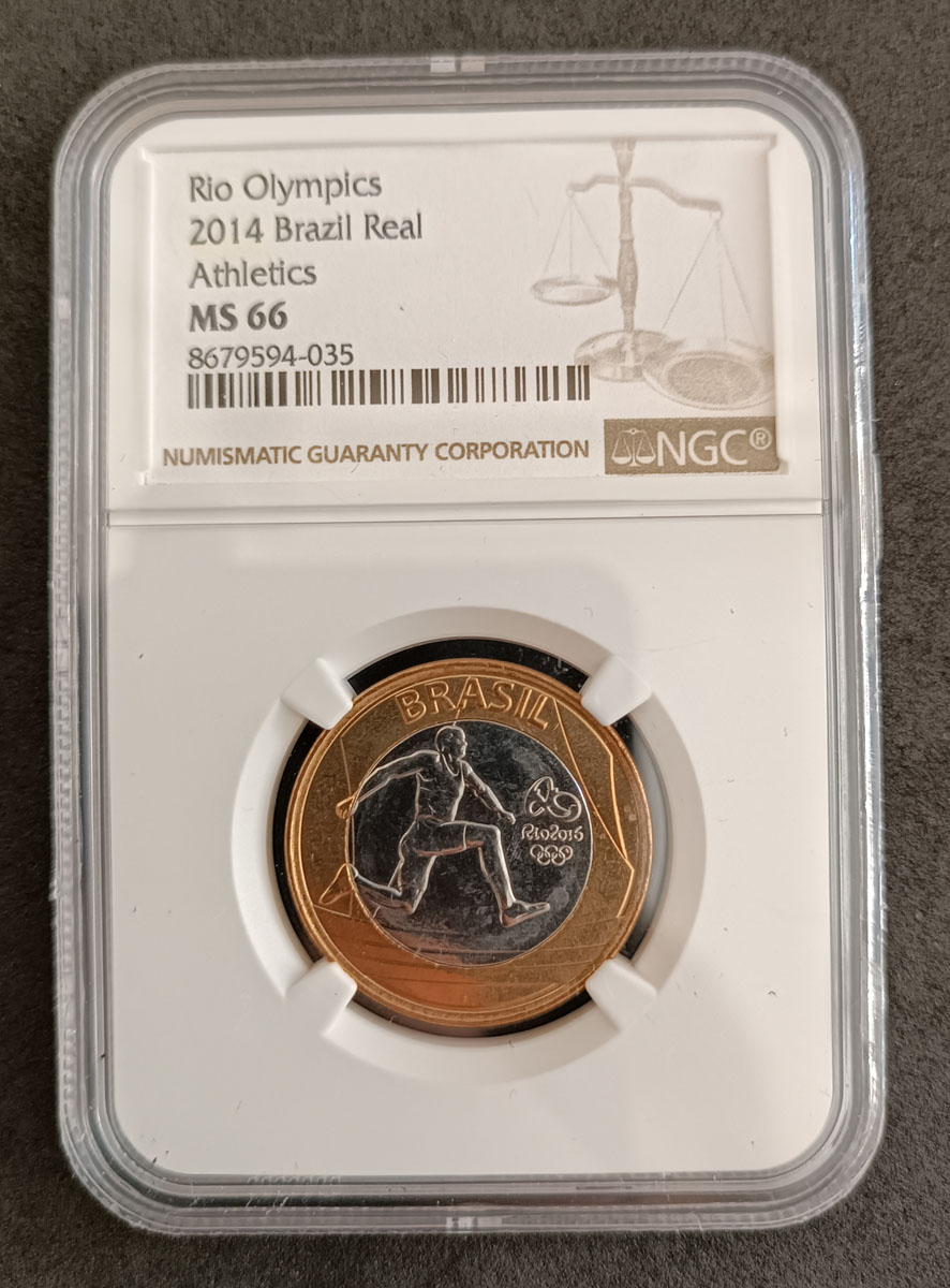 BRASIL - 1 REAL 2014 - MS66 - COMEMORATIVA AS OLIMPIADAS - ATLETISMO - PEÇA ENCAPSULADA E GRADUADA PELA NGC
