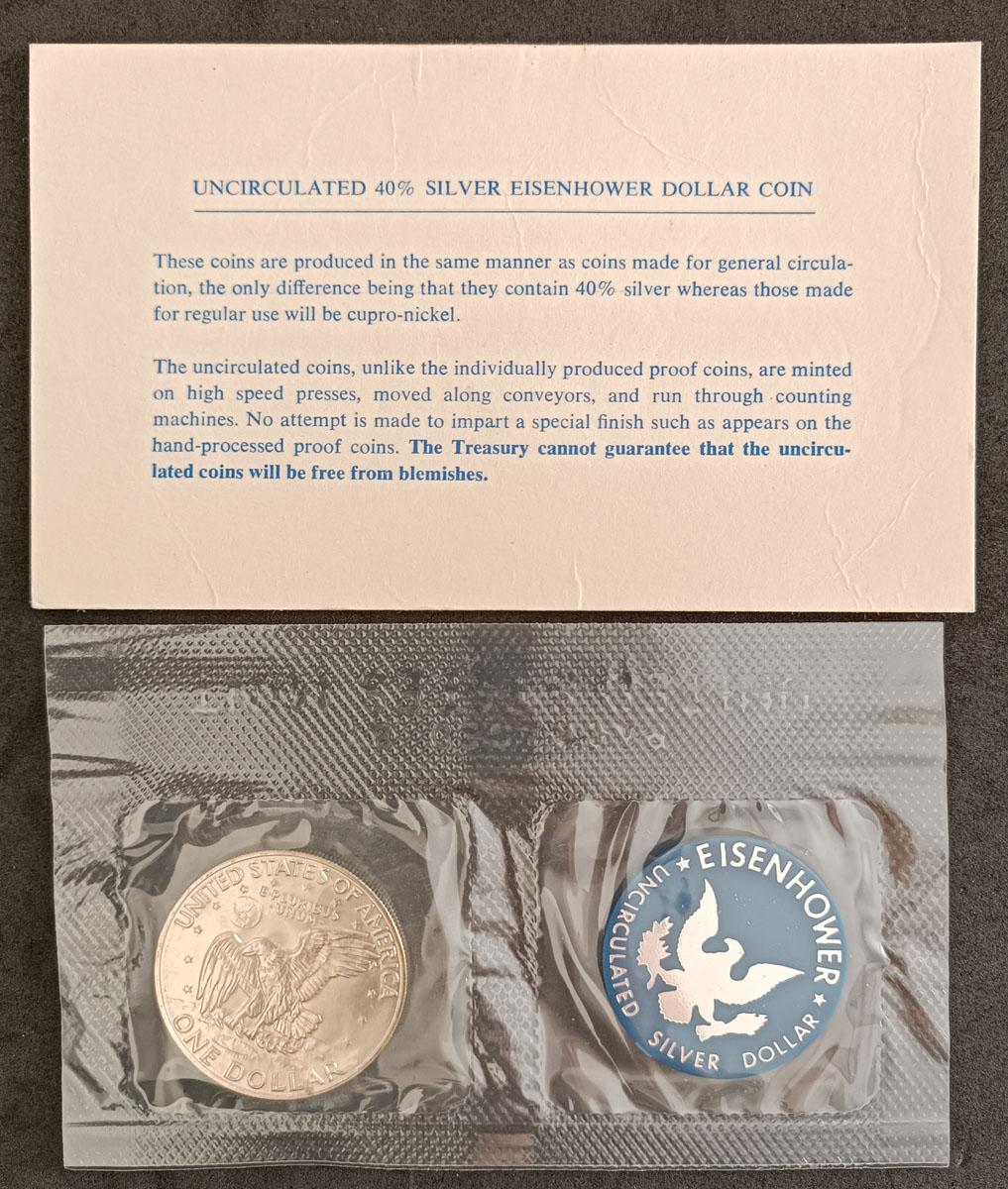 EUA - 1 DOLLAR 1974 - FC PRATA - MOEDAS PRODUZIDAS DA MESMA MANEIRA QUE AS FEITAS PARA  CIRCULAÇÃO GERAL, A ÚNICA DIFERENÇA É QUE ELAS CONTEM 40%DE PRATA, ENQUANTO AS FEITAS PARA USO REGULAR SÃO DE CUPRO-NIQUEL