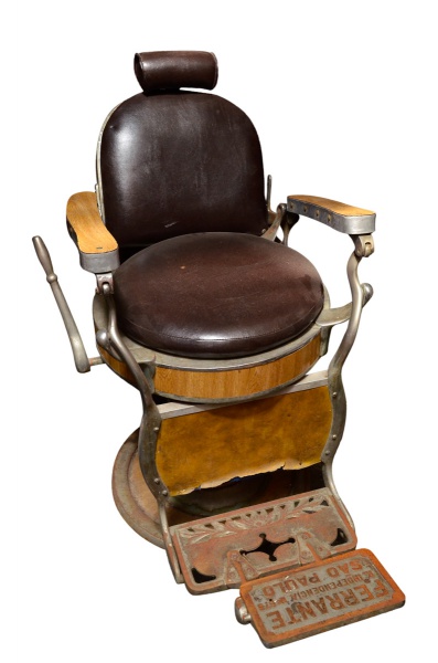 Antiga cadeira de barbeiro.