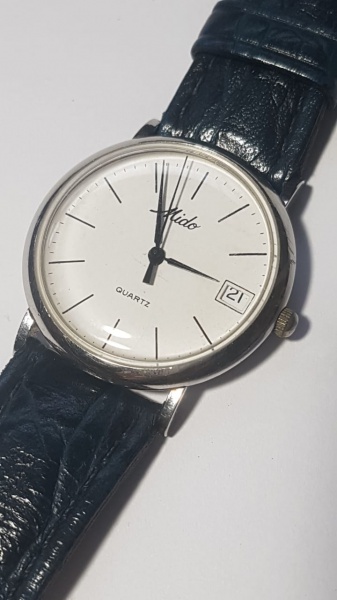 relógio mido quartz