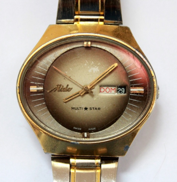 relogio mido multi star