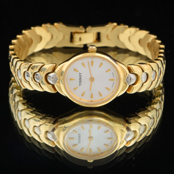 relogio tissot feminino dourado