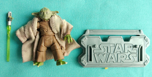 Antigo brinquedo do Star Wars  Yoda , medindo