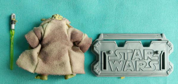 Antigo brinquedo do Star Wars  Yoda , medindo