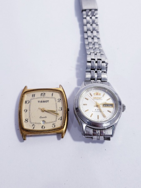 2 rel gios Tissot e Orient precisam de ajustes para fu