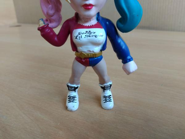 Boneca Arlequina personagem da Dc Comics e com particip