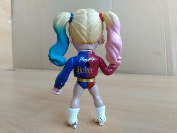 Boneca Arlequina personagem da Dc Comics e com particip