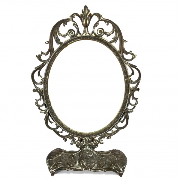 Antigo e elegante espelho de mesa em metal rematado com  folhas de acanto sobre base robusta. Exemplar em excelente estado. Dimensões: 40 cm x 20 cm x 6 cm.