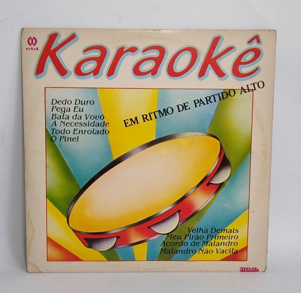 Antigo e Original Disco de Vinil - LP - KARAOKÊ - EM RITMO DE PARTIDO ALTO - 1986 - Conforme fotos - Medida: 31 x 31 cm.