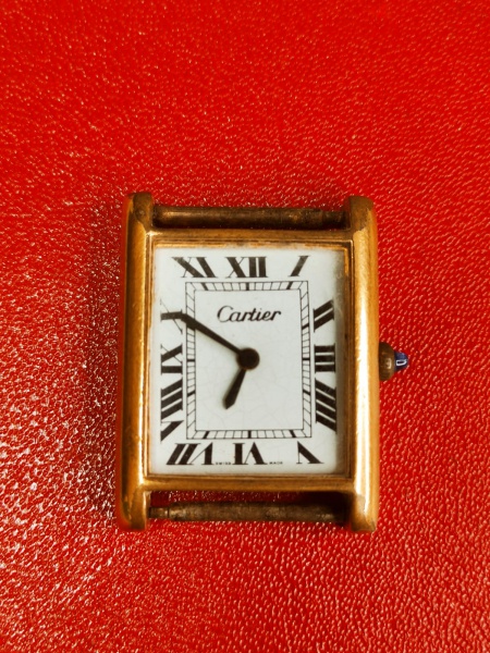 Relógio de pulso feminino CARTIER , caixa retangular banhada a ouro 18k