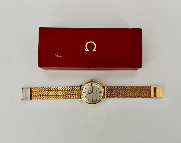 Relógio Omega de pulso com caixa e pulseira em ouro 18 K- Funcionando.