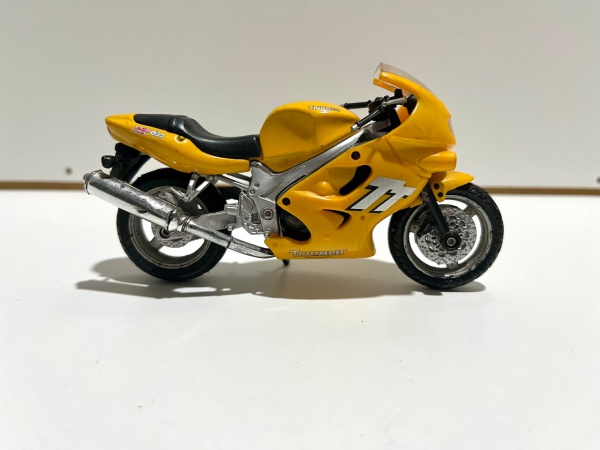 Miniatura Moto Kawasaki ZX9R prata e azul. Escala 1/18,