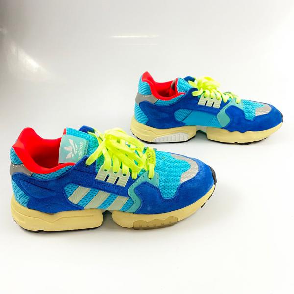 錦 Tênis da ADIDAS ZX 750 Torsion na cor azul com detalhes em verde e