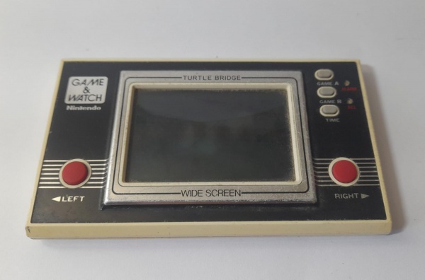 Mini game Nintendo Turtle Bridge, anos 80. No estado. Ao inserir