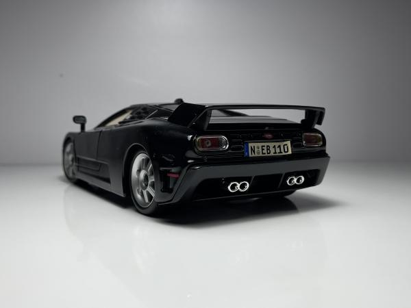 Dauer EB110 Preto - Maisto Escala 1/18 miniatura em met