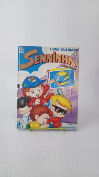 Livro Ilustrado Seninha e sua Turma; 1995; Editora: Multi; Idioma: Português; 32 páginas. Livro capa dura em bom estado de conservação. Oxidação e amarelado em todo o exemplar. Desgastes nas extremidades da capa, contracapa e lombada. Manchas na capa e contracapa. Álbum incompleto. Dimensões: 20,5 cm x 28 cm x 1 cm. Peso: 0,532 kg.