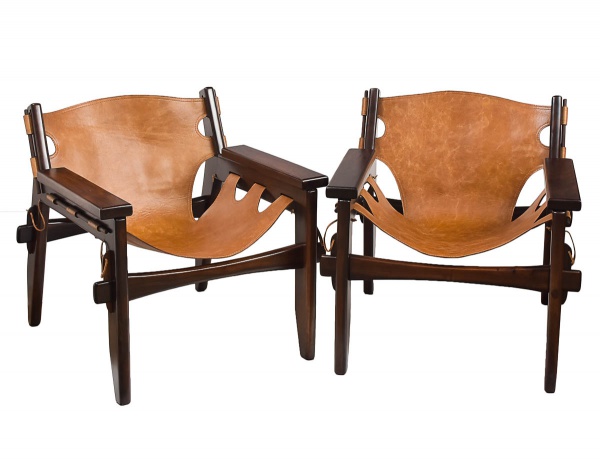 SERGIO RODRIGUES - Par de poltronas Kilim em jacarandá e couro lavado e envelhecido. Med.: 65x65x70 cm.