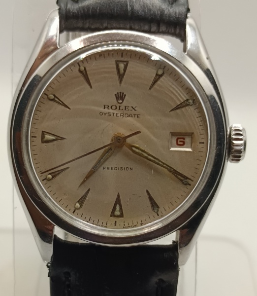 ROLEX, SUÍÇO, AÇO, CORDA MANUAL, VISOR DE ACRÍLICO, 34MM DE CAIXA, MODELO OYSTER DATE PRECISION VÍNTAGE