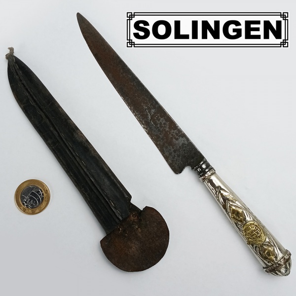 SOLINGEN Franz Wenk: faca antiga com cabo em metal prateado com detalhes dourados, bainha de couro. | 25,5 cm total e 15 cm lâmina