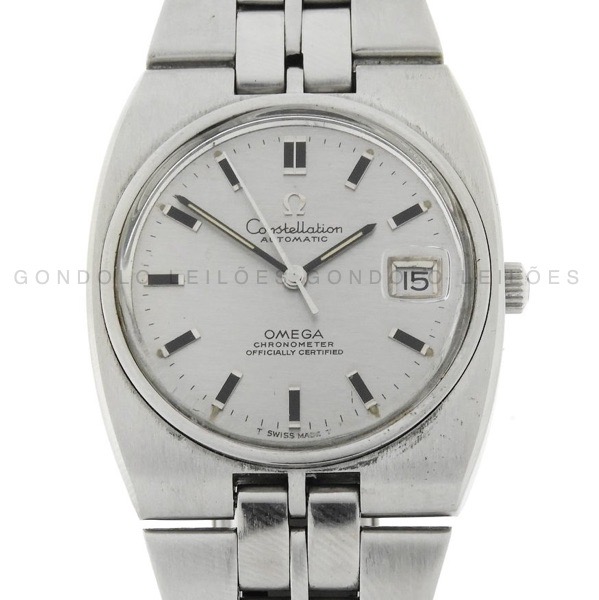 Relógio Omega Constellation C-Shape Vintage Automatic - Ref. 166.055 - Caixa em Aço - Pulseira em Aço - Tamanho da caixa: 37 mm - Funções: Horas - Minutos - Segundos - Calendário - - Movimento: Automático Cal. 1001 - Visor: Acrílico - Fabricação 1969 - Acompanha: - Certificado The Watch Register - Observações: Para pulso de aproximadamente 20cm