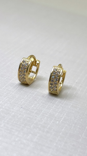 Joias . ANEL BANANA CONFECCIONADO EM OURO AMARELO 18K, COM ZIRC foto 1