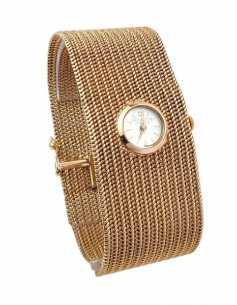 Relógio Pan Watch, movimento suíco, possivelmente de corda manual. Caixa e pulseira em ouro 18k, con