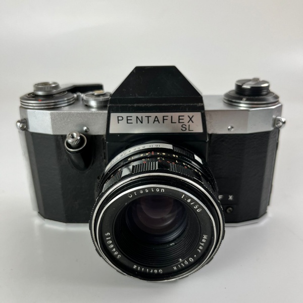 Joias . Câmera fotográfica analógica alemã Penta Flex, modelo SL com objetiva ...