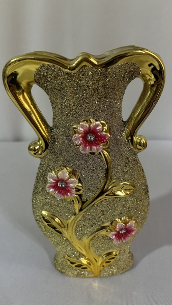 Joias . Vaso decorativo dourado com glitter e flores em relevo medindo 19cm