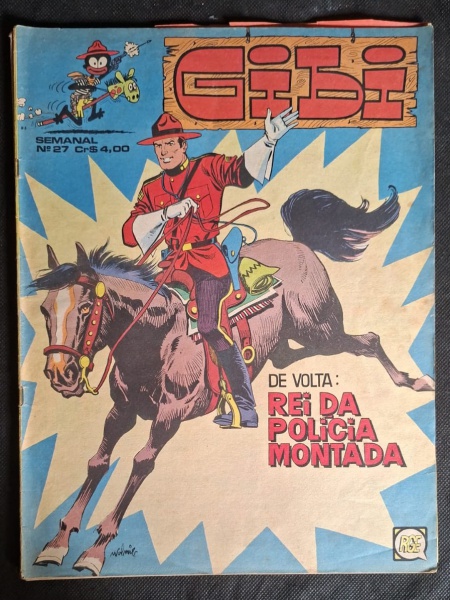 Revista em quadrinhos brasileira intitulada "Gibí", um semanário nº 27, com preço de Cr$ 4,00. A capa apresenta um policial montado a cavalo em destaque, com o subtítulo "De Volta: Rei da Polícia Mont