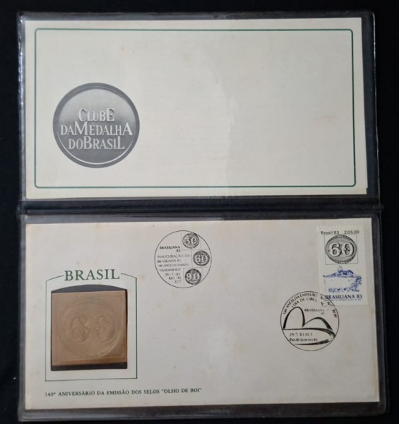 Medalha envelope 1.º dia + medalha - Clube da Medalha do Brasil - 140º aniversário Selo "Olho de Boi" -Anos 80 - Pasta Plástica dupla .