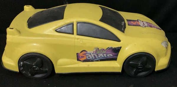 Carro de Brinquedo Speedy Turbo Amarelo, sem o aerofólio, no estado em plástico rígido. Med. 44cm x 20,5cm