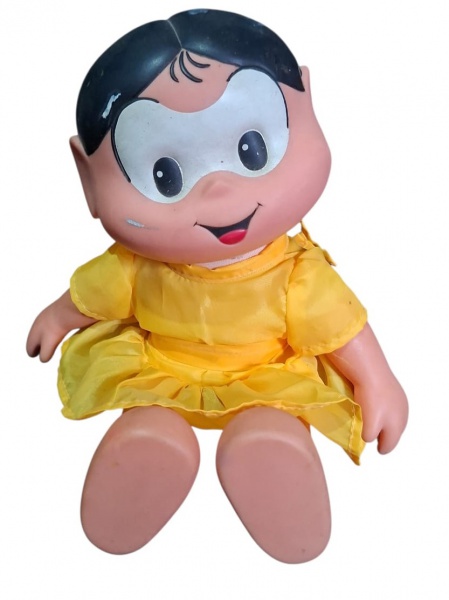 Boneca Magali - Turma da Mônica - comp. 35cm - Magali, a amiga do Cebolinha que ama melancia. Vestido amarelo + cabelo preto curtinho + óculos brancos característicos - Material: Cabeça/braços/pernas