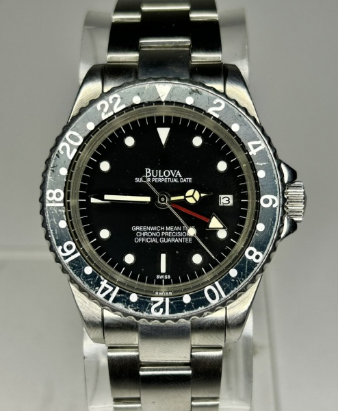 Relogios . Bulova Perpetual Date - Relógio suíço de pulso automático com pulseira em aço e ...