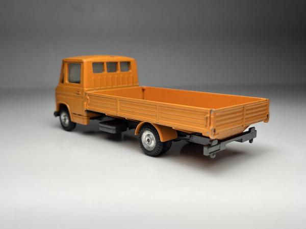 Mercedes Benz L407 D - 608 Laranja - Cursor Modell Esca