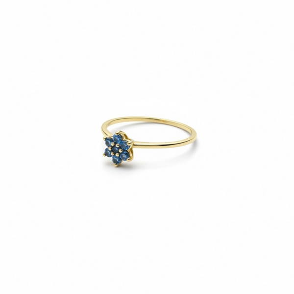 Anel com safiras azuis pesando aproximadamente 1.26g, ouro amarelo 18k. Safiras azuis pesando aproximadamente 0.14ct ao todo aro 17.