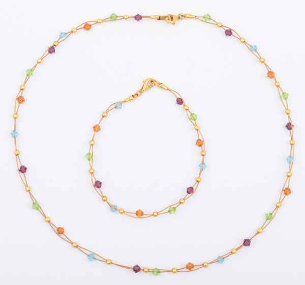 Conjunto de gargantilha com pulseira em ouro 18k com pedras brasileiras. Medida pulseira 18cm. Medida gargantilha 40cm. Peso total: 10,3g.